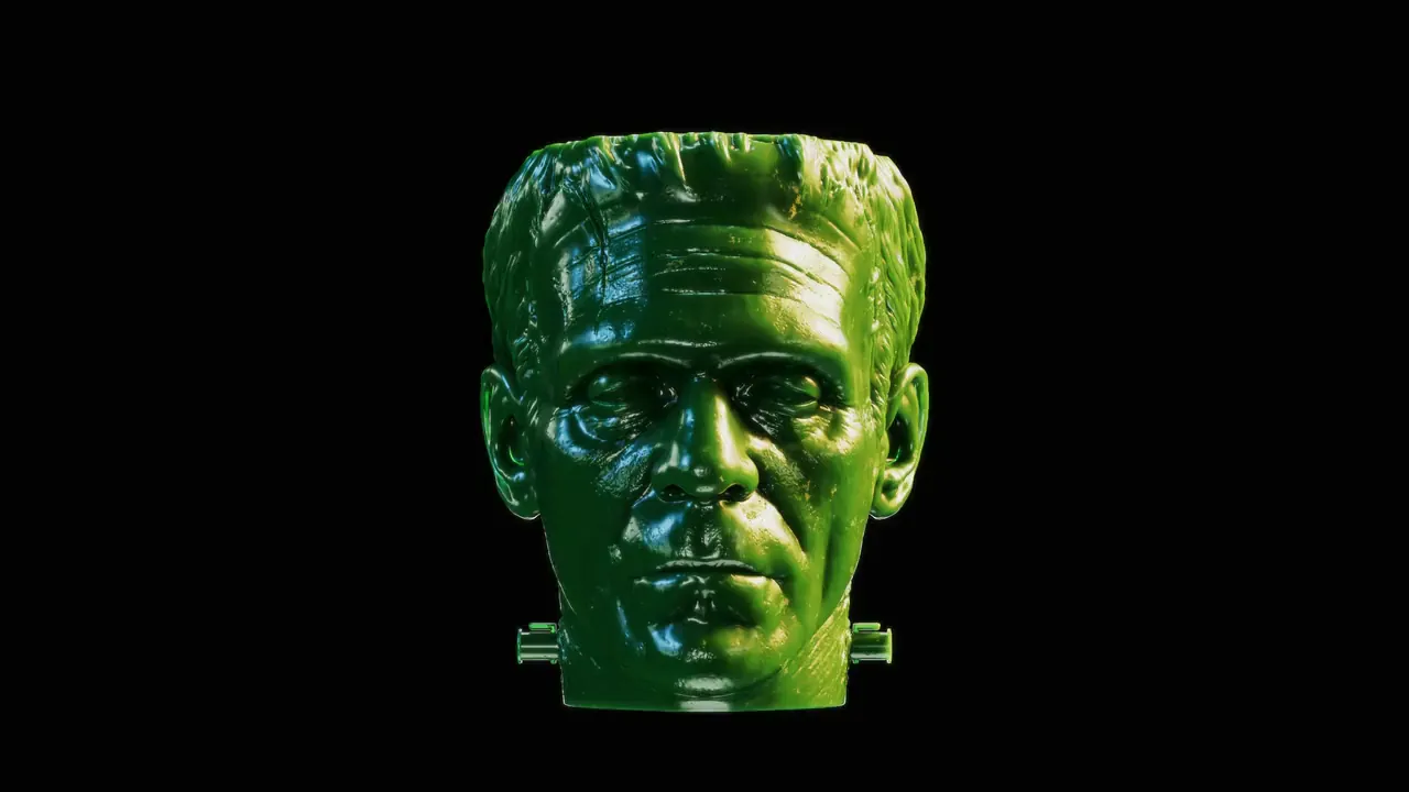 The Frankenstein cup rendered in 3D against black, seen face on, the stitches and bolts catching the light